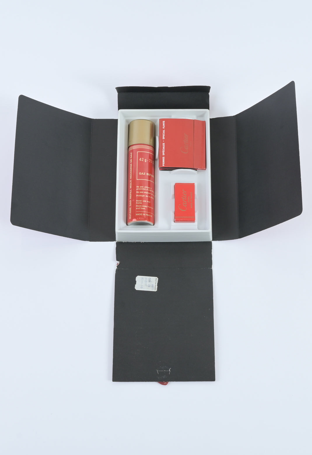 Cartier / Swiss 1970s must de cartier guilloché pattern brass lighter