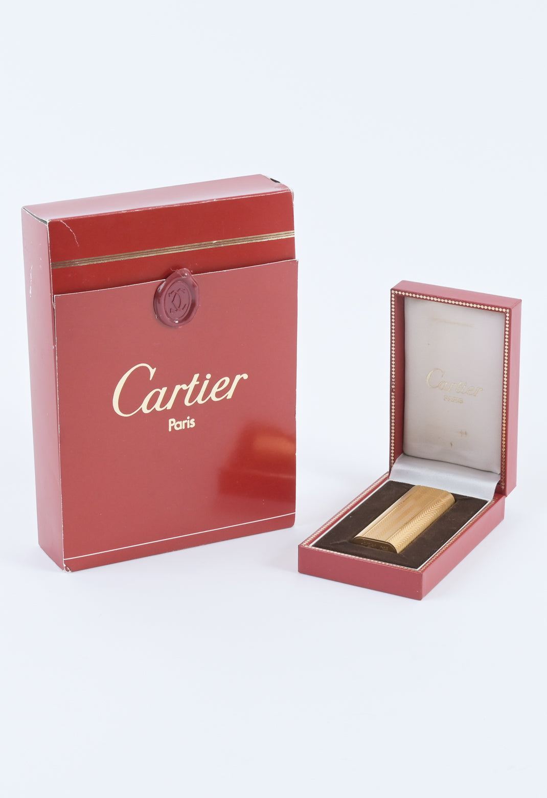 Cartier / Swiss 1970s must de cartier guilloché pattern brass lighter